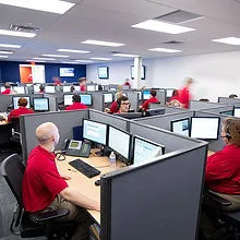 Operators monitoring alerts in a control centre