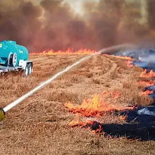 The Blaze Terminator suppressing a grass fire autonomously